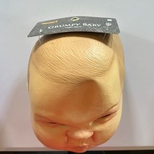 Spirit Halloween Grumpy Baby latex mask